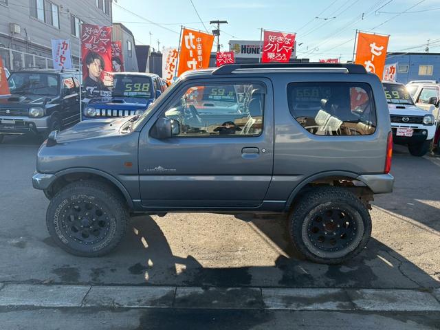 ジムニー ランドベンチャー　ＡＴ車　リフトアップ　オーディオ　電動格納ミラー　ドアサイドバイザー　オフロードタイヤ　４ＷＤ　ＡＢＳ（14枚目）