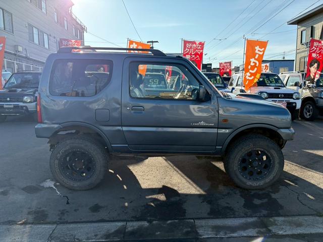 ジムニー ランドベンチャー　ＡＴ車　リフトアップ　オーディオ　電動格納ミラー　ドアサイドバイザー　オフロードタイヤ　４ＷＤ　ＡＢＳ（15枚目）