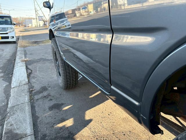 ジムニー ランドベンチャー　ＡＴ車　リフトアップ　オーディオ　電動格納ミラー　ドアサイドバイザー　オフロードタイヤ　４ＷＤ　ＡＢＳ（25枚目）