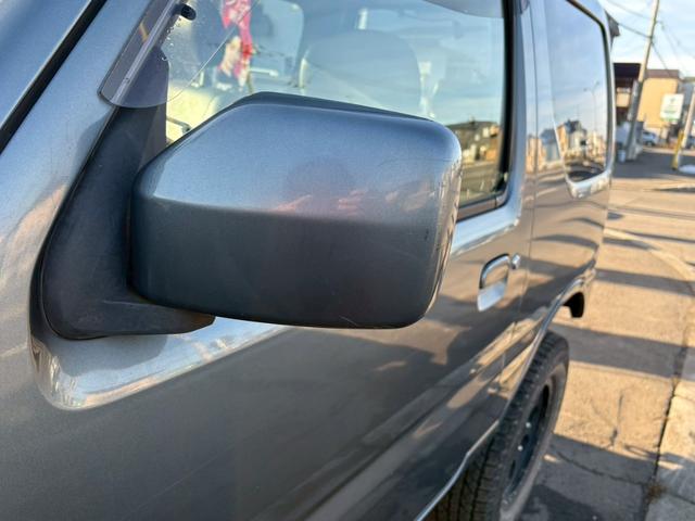 ジムニー ランドベンチャー　ＡＴ車　リフトアップ　オーディオ　電動格納ミラー　ドアサイドバイザー　オフロードタイヤ　４ＷＤ　ＡＢＳ（26枚目）