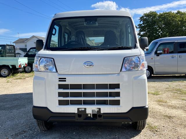 ハイゼットカーゴ ＤＸ　届出済み未使用車　衝突被害軽減ブレーキ　キーレスエントリー　パートタイム４ＷＤ　オートライト　オートハイビーム　マニュアルエアコン　クリアランスソナー　アイドリングストップ　スピーカー一体型ラジオ（2枚目）