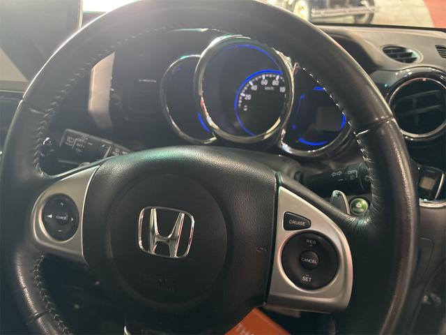 N-BOXカスタム G・ターボLパッケージ 4WD ETC バックカメラ 両側電動スライドドア ナビ TV オートクルーズコントロール HID スマートキー アイドリングストップ 電動格納ミラー シートヒーター ベンチシート CVT(3枚目)