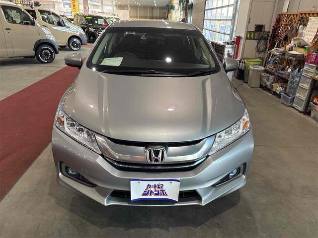 グレイス ハイブリッドＬＸ　４ＷＤ　オートクルーズコントロール　バックカメラ　ナビ　ＴＶ　アルミホイール　オートライト　ＬＥＤヘッドランプ　ＡＴ　シートヒーター　スマートキー　アイドリングストップ　電動格納ミラー（14枚目）