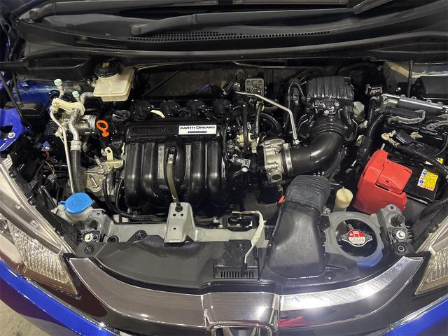 フィットハイブリッド Ｆパッケージ　４ＷＤ　ハイブリッド　バックカメラ　ＴＶ　オートクルーズコントロール　オートライト　スマートキー　アイドリングストップ　電動格納ミラー　ＡＴ　盗難防止システム　衝突安全ボディ　ＣＤ　ＤＶＤ再生　ＵＳＢ（20枚目）