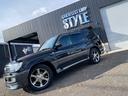 ランドクルーザー100 VXリミテッド GセレクションツーリングED ディーゼルターボ サンルーフ 純正エアロパーツ MKW20インチAW ガナドール4本出しマフラー パワーシート シートヒーター データシステムエアサスコントローラー 純正ナビ地デジ バックカメラ 中古車画像_2