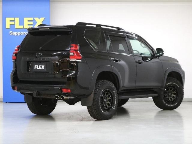 ランドクルーザープラド ＴＸ　Ｌパッケージ　ワンオーナー　リフトＵＰ　ＪＡＯＳスキッドバー　オーバーフェンダー　サンルーフ　ＢＩＧ－Ｘ１１ナビ　フロント＆バックカメラ　レイズホイール　グッドリッチ　ロッソモデロマフラー　ヒッチメンバー　寒冷地（3枚目）