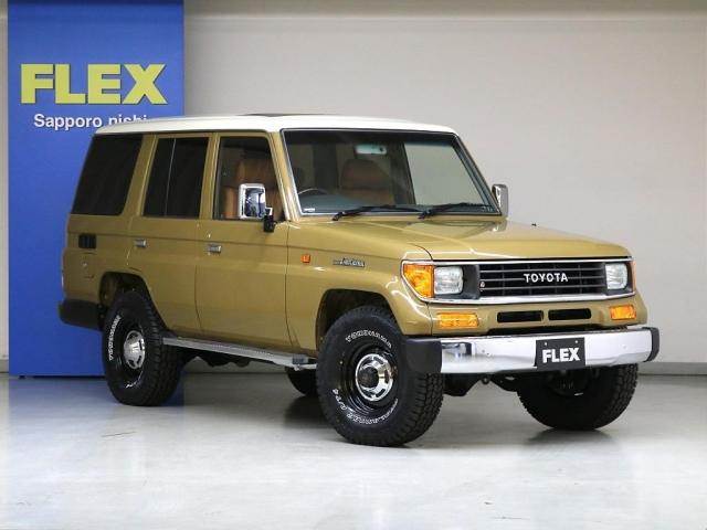 ランドクルーザープラド EXワイド 全塗装サンドII 新品グリル 新品灯火類 サンルーフ ディスプレイオーディオ ウッドコンビハンドル 新品シフトノブ 新品シートカバー 新品タイヤホイール タイミングベルト交換済み スモークフィルム施工(4枚目)