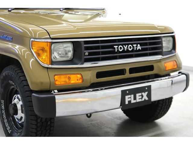 ランドクルーザープラド EXワイド 全塗装サンドII 新品グリル 新品灯火類 サンルーフ ディスプレイオーディオ ウッドコンビハンドル 新品シフトノブ 新品シートカバー 新品タイヤホイール タイミングベルト交換済み スモークフィルム施工(22枚目)