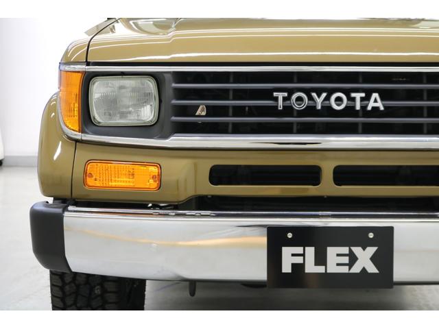 ランドクルーザープラド EXワイド 全塗装サンドII 新品グリル 新品灯火類 サンルーフ ディスプレイオーディオ ウッドコンビハンドル 新品シフトノブ 新品シートカバー 新品タイヤホイール タイミングベルト交換済み スモークフィルム施工(23枚目)