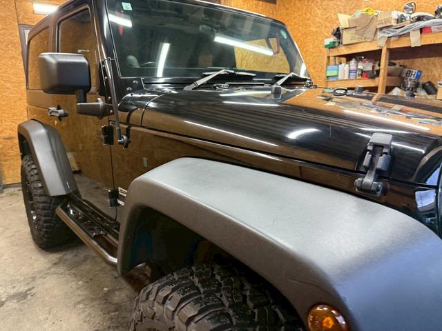 ジープ・ラングラー スポーツ 4WD ETC オートクルーズコントロール サンルーフ アルミホイール AT 盗難防止システム Bluetooth ABS エアコン パワーウィンドウ 運転席エアバッグ 助手席エアバッグ(54枚目)