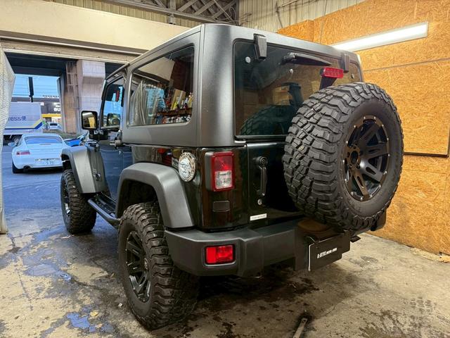 ジープ・ラングラー スポーツ 4WD ETC オートクルーズコントロール サンルーフ アルミホイール AT 盗難防止システム Bluetooth ABS エアコン パワーウィンドウ 運転席エアバッグ 助手席エアバッグ(56枚目)