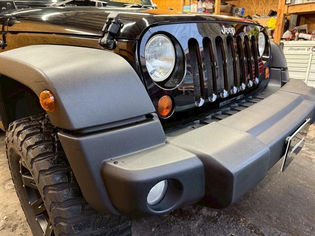 ジープ・ラングラー スポーツ 4WD ETC オートクルーズコントロール サンルーフ アルミホイール AT 盗難防止システム Bluetooth ABS エアコン パワーウィンドウ 運転席エアバッグ 助手席エアバッグ(57枚目)