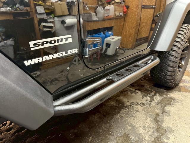 ジープ・ラングラー スポーツ 4WD ETC オートクルーズコントロール サンルーフ アルミホイール AT 盗難防止システム Bluetooth ABS エアコン パワーウィンドウ 運転席エアバッグ 助手席エアバッグ(63枚目)