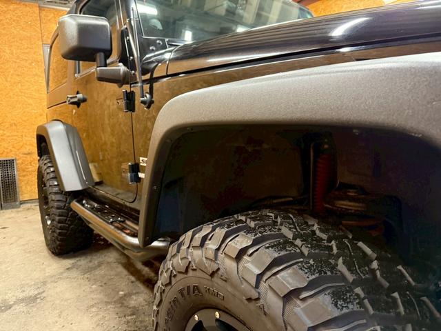 ジープ・ラングラー スポーツ 4WD ETC オートクルーズコントロール サンルーフ アルミホイール AT 盗難防止システム Bluetooth ABS エアコン パワーウィンドウ 運転席エアバッグ 助手席エアバッグ(67枚目)