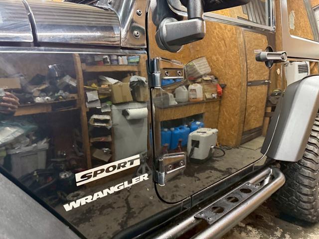 ジープ・ラングラー スポーツ 4WD ETC オートクルーズコントロール サンルーフ アルミホイール AT 盗難防止システム Bluetooth ABS エアコン パワーウィンドウ 運転席エアバッグ 助手席エアバッグ(68枚目)