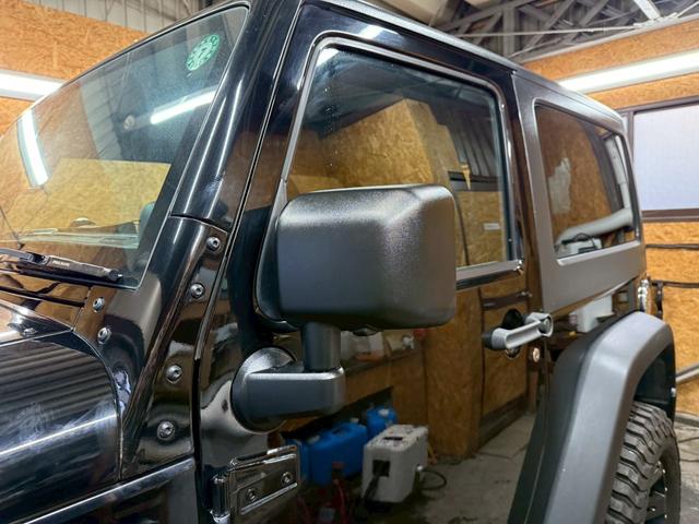 ジープ・ラングラー スポーツ 4WD ETC オートクルーズコントロール サンルーフ アルミホイール AT 盗難防止システム Bluetooth ABS エアコン パワーウィンドウ 運転席エアバッグ 助手席エアバッグ(69枚目)