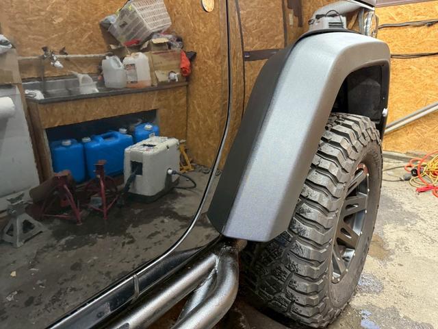 ジープ・ラングラー スポーツ 4WD ETC オートクルーズコントロール サンルーフ アルミホイール AT 盗難防止システム Bluetooth ABS エアコン パワーウィンドウ 運転席エアバッグ 助手席エアバッグ(70枚目)