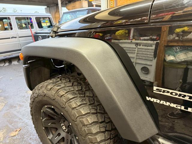 ジープ・ラングラー スポーツ 4WD ETC オートクルーズコントロール サンルーフ アルミホイール AT 盗難防止システム Bluetooth ABS エアコン パワーウィンドウ 運転席エアバッグ 助手席エアバッグ(77枚目)