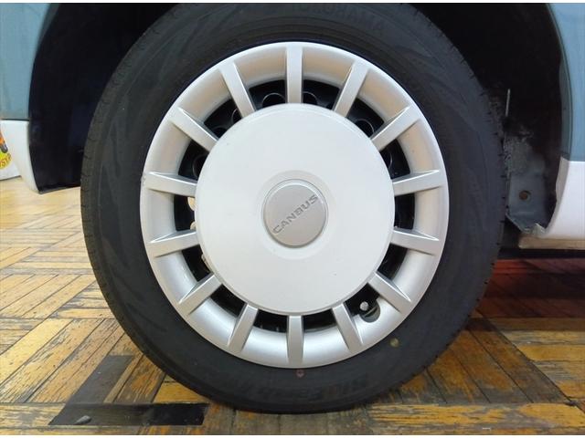 ムーヴキャンバス ストライプスＧターボ　純正９インチナビＴＶ　パノラマモニター　４ＷＤ　衝突軽減ブレーキ　Ｂｌｕｅｔｏｏｔｈ　ドラレコ　両側パワースライドドア　禁煙　ＬＥＤ　盗難防止装置　前席シートヒーター　ＥＴＣ　横滑り防止装置　エアコン（35枚目）