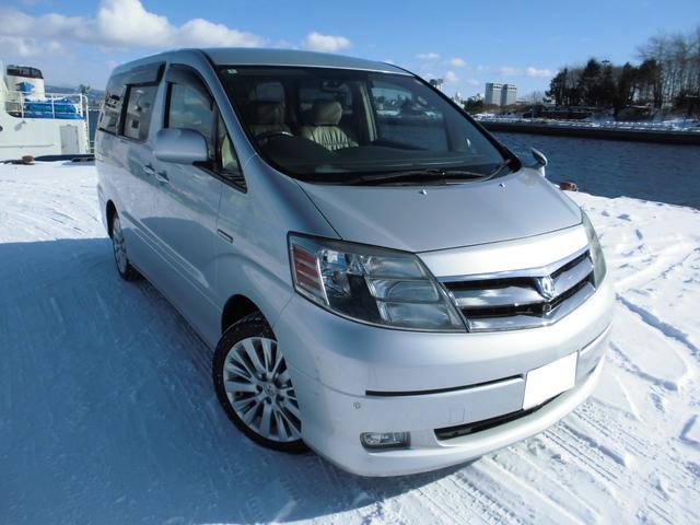 アルファードハイブリッド Gエディション 4WD ワンオーナー 往年整備記録簿全て有り 両側PWスライドドア 革調シートカバー クルコン ETC HID メーカーHDDナビ Bカメラ 夏冬タイヤアルミセット 近畿地方仕入れサビ無し(4枚目)