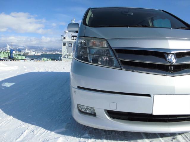 アルファードハイブリッド Gエディション 4WD ワンオーナー 往年整備記録簿全て有り 両側PWスライドドア 革調シートカバー クルコン ETC HID メーカーHDDナビ Bカメラ 夏冬タイヤアルミセット 近畿地方仕入れサビ無し(6枚目)