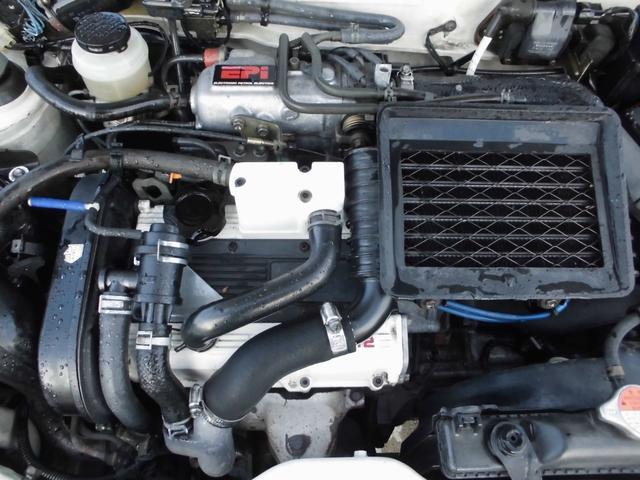 アルトワークス ＲＳ／Ｒ　５ＭＴ　４ＷＤ　ツインカムＩＣターボ　ＲＳ－Ｒダウンサス　社外ラテラルロッド　ＬＥＤヘッド　砲弾スポーツマフラー　タイベル交換済　ラッピング　社外ハンドル　ＥＴＣ　関東仕入れサビ無し　修復歴無し（34枚目）