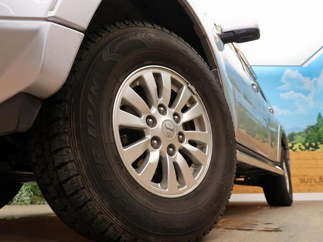 ロング GR 禁煙車 5MT車 4WD SDナビ バックカメラ HIDヘッドライト オートエアコン リアフォグ ETC 純正アルミホイール オートライト(14枚目)