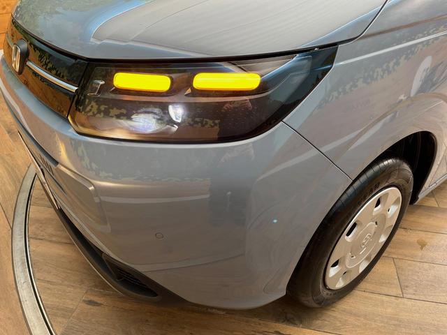 フリード エアー　４ＷＤ　登録済み未使用車　純正ディスプレイオーディオ　両側電動スライドドア　ホンダセンシング　レーダークルーズコントロール　前席シートヒーター　寒冷地仕様　ＬＥＤヘッドライト（15枚目）