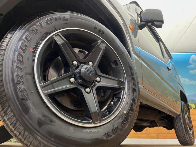 ジムニー ＸＬ　４ＷＤ　５速ＭＴ車　衝突被害軽減システム　禁煙車　シートヒーター　スマートキー　ＥＴＣ　車線逸脱警報　オートライト　オートエアコン　ミラーヒーター　アイドリングストップ（13枚目）