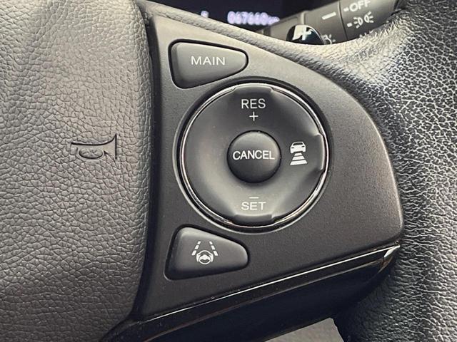 ヴェゼル ハイブリッドＸ・ホンダセンシング　４ＷＤ　禁煙車　ホンダセンシング　純正ナビ　寒冷地仕様　アダプティブクルーズコントロール　シートヒーター　ＥＴＣ　バックカメラ　純正１６インチアルミホイール　純正革巻きステアリング（6枚目）