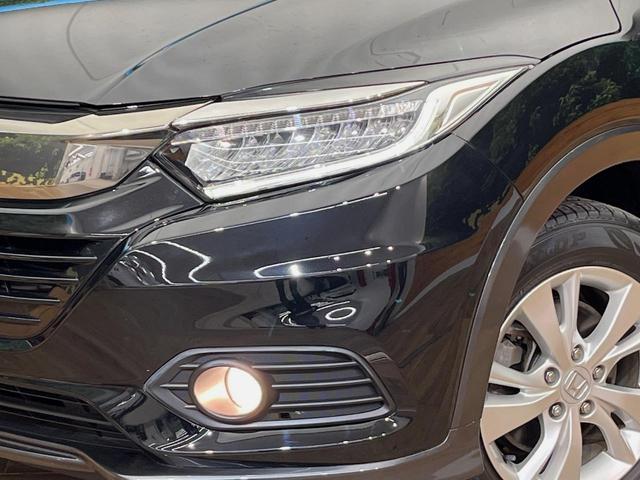 ヴェゼル ハイブリッドＸ・ホンダセンシング　４ＷＤ　禁煙車　ホンダセンシング　純正ナビ　寒冷地仕様　アダプティブクルーズコントロール　シートヒーター　ＥＴＣ　バックカメラ　純正１６インチアルミホイール　純正革巻きステアリング（12枚目）