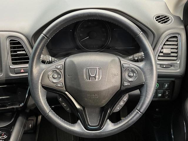 ヴェゼル ハイブリッドＸ・ホンダセンシング　４ＷＤ　禁煙車　ホンダセンシング　純正ナビ　寒冷地仕様　アダプティブクルーズコントロール　シートヒーター　ＥＴＣ　バックカメラ　純正１６インチアルミホイール　純正革巻きステアリング（40枚目）