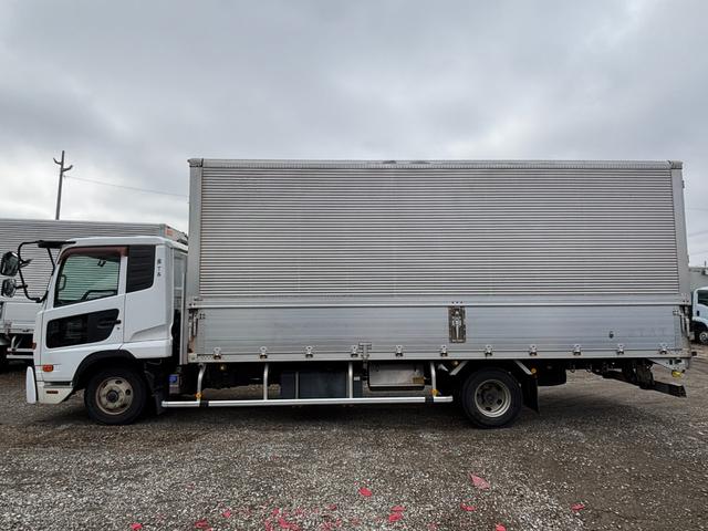 コンドル 　４ｔ　ワイド　アルミウィング　ベッド付　荷台寸６．２ｍ長×２．４ｍ幅　走行３２７９００ｋｍ　２１５馬力　６速　定員２名　積載量３０００ｋｇ　車輌総重量７９８０ｋｇ　車検令和７年１０月まで　アドブルー（11枚目）