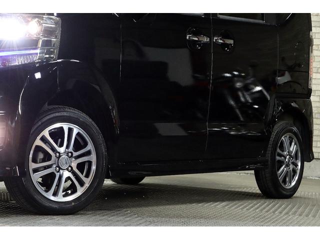 Ｎ－ＢＯＸカスタム Ｇ・Ｌパッケージ４ＷＤ後期型ｘ夏冬タイヤセット付ｘエンスタ　クラッツィオ黒革調シートカバー／左右後席テーブル／シティブレーキアクティブシステム／リア左右サンシェード／フルセグＴＶ／ＣＤ／ＤＶＤ／ルームランプＬＥＤ／ＨＩＤヘッド／ドアバイザー／ウインカーミラー（69枚目）