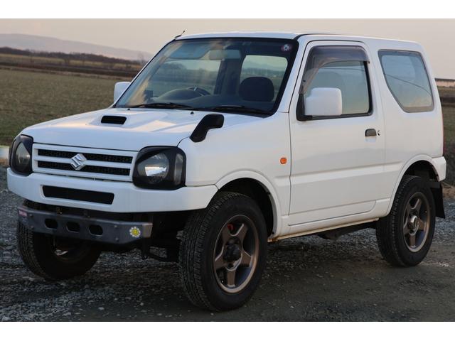 ジムニー ＸＧ　検２年　社外バンパー　社外マフラー　社外ナビ　キーレス（3枚目）