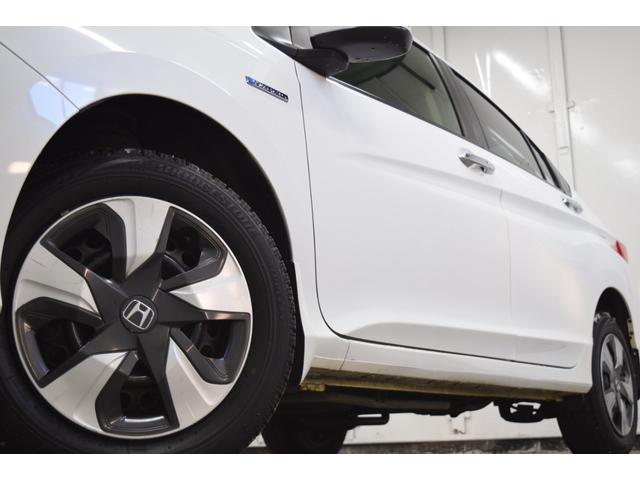 グレイス ハイブリッドLX 4WD 1年保証/走行無制限 事故歴なし 修復歴なし 純正Gathersナビ 寒冷地仕様 LEDヘッドL クルコン シートヒーター エンジンプッシュスタート ETC ステアリングスイッチ ECON(14枚目)