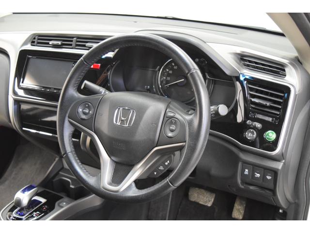 グレイス ハイブリッドLX 4WD 1年保証/走行無制限 事故歴なし 修復歴なし 純正Gathersナビ 寒冷地仕様 LEDヘッドL クルコン シートヒーター エンジンプッシュスタート ETC ステアリングスイッチ ECON(30枚目)