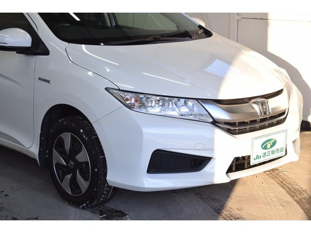 グレイス ハイブリッドLX 4WD 1年保証/走行無制限 事故歴なし 修復歴なし 純正Gathersナビ 寒冷地仕様 LEDヘッドL クルコン シートヒーター エンジンプッシュスタート ETC ステアリングスイッチ ECON(52枚目)