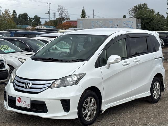フリード G エアロ 4WD ドライブレコーダー ETC バックカメラ ナビ TV 両側スライド・片側電動 HID スマートキー 電動格納ミラー 3列シート ウォークスルー AT アルミホイール CD USB(12枚目)