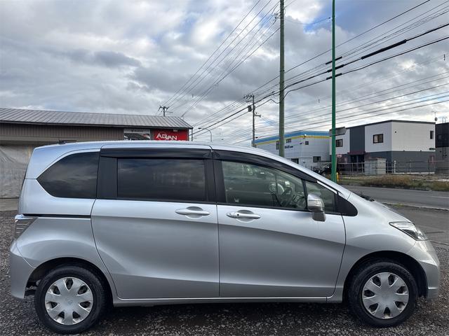 フリード Ｇ　ジャストセレクション　４ＷＤ　ＥＴＣ　バックカメラ　ナビ　ＴＶ　オートクルーズコントロール　両側電動スライドドア　スマートキー　電動格納ミラー　３列シート　ウォークスルー　ＡＴ　ＣＤ　ＤＶＤ再生　ＵＳＢ　盗難防止システム（25枚目）