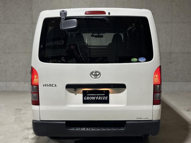 ハイエースバン ロングＤＸ　ディーゼル　本州車両　内外装美装仕上　リアヒーター　４ＷＤ　寒冷地　ディーゼル　メモリーナビ　バックカメラ　ワンセグ　ＥＴＣ　盗難防止装置　キーレス　横滑り防止機能　３列シート　乗車定員９人（32枚目）