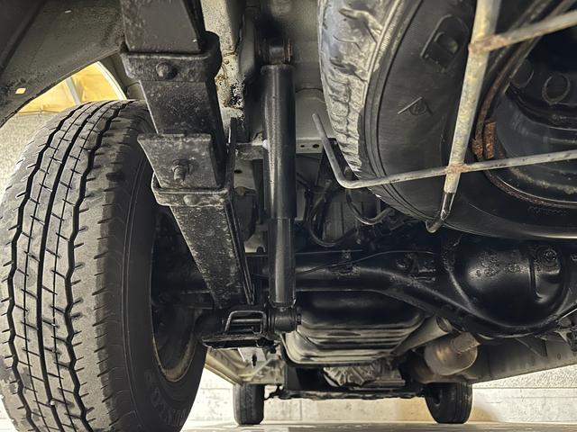 ハイエースバン ロングＤＸ　ディーゼル　本州車両　内外装美装仕上　リアヒーター　４ＷＤ　寒冷地　ディーゼル　メモリーナビ　バックカメラ　ワンセグ　ＥＴＣ　盗難防止装置　キーレス　横滑り防止機能　３列シート　乗車定員９人（34枚目）