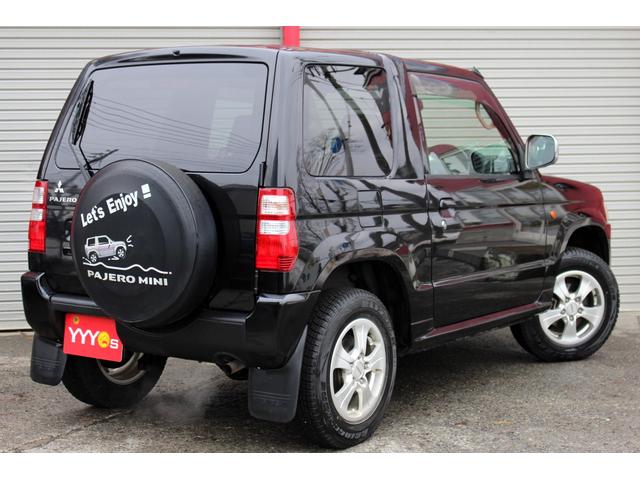 パジェロミニ プレミアムセレクション　ユーザー買取直販・ストラーダナビ・フルセグテレビ・ＥＴＣ・シートヒーター・パートタイム４ＷＤ・盗難防止システム・衝突安全ボディ・キーレスエントリー・寒冷地仕様運転席エアバック・助手席エアバック・ＡＢＳ（50枚目）