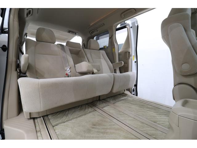 アルファード ２４０Ｘ　純正７型ＳＤナビ　バックカメラ　寒冷地仕様　ワイパーデアイサー　両側パワースライドドア　クリアランスソナー　ビルトインＥＴＣ　ＨＩＤヘッドライト　ＬＥＤフォグライト　８人乗り　２列目ベンチシート（9枚目）