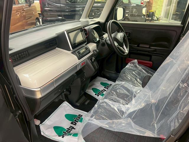 スペーシア ハイブリッドＸ　４ＷＤ　スマートキー　ＡＢＳ　アイドリングストップ　両側パワースライドドア　社外ナビ付き　オートエアコン　電動格納ドアミラー（9枚目）
