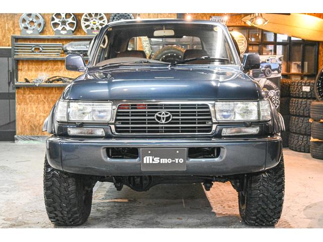 ランドクルーザー80 VXリミテッド 社外AW・MTタイヤ・社外マフラー・ブラウンレザー調シートカバー(3枚目)