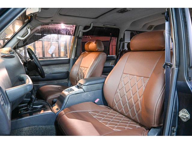 ランドクルーザー80 VXリミテッド 社外AW・MTタイヤ・社外マフラー・ブラウンレザー調シートカバー(12枚目)