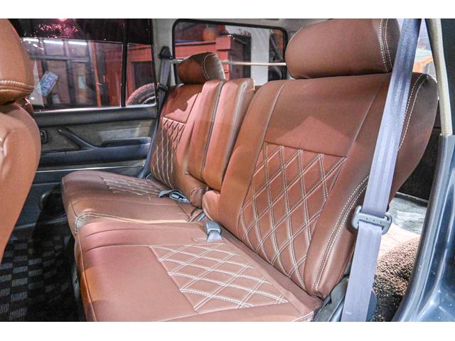 ランドクルーザー80 VXリミテッド 社外AW・MTタイヤ・社外マフラー・ブラウンレザー調シートカバー(13枚目)