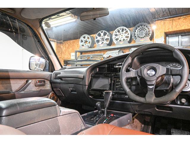 ランドクルーザー80 VXリミテッド 社外AW・MTタイヤ・社外マフラー・ブラウンレザー調シートカバー(14枚目)
