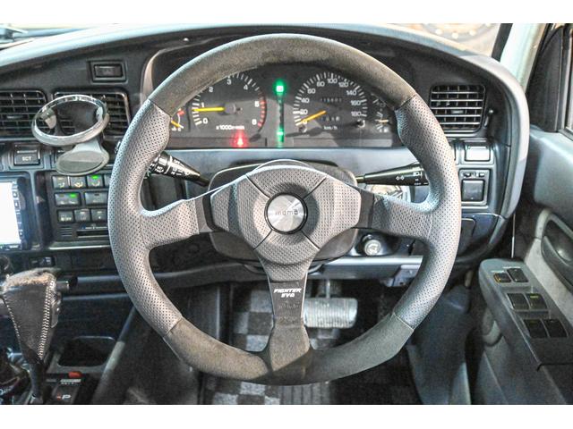 ランドクルーザー80 VXリミテッド 社外AW・MTタイヤ・社外マフラー・ブラウンレザー調シートカバー(15枚目)